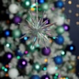 Festive Hanging Glitter Starburst Iridescent 12cm Festive Hanging Glitter Starburst Iridescent 12cm
